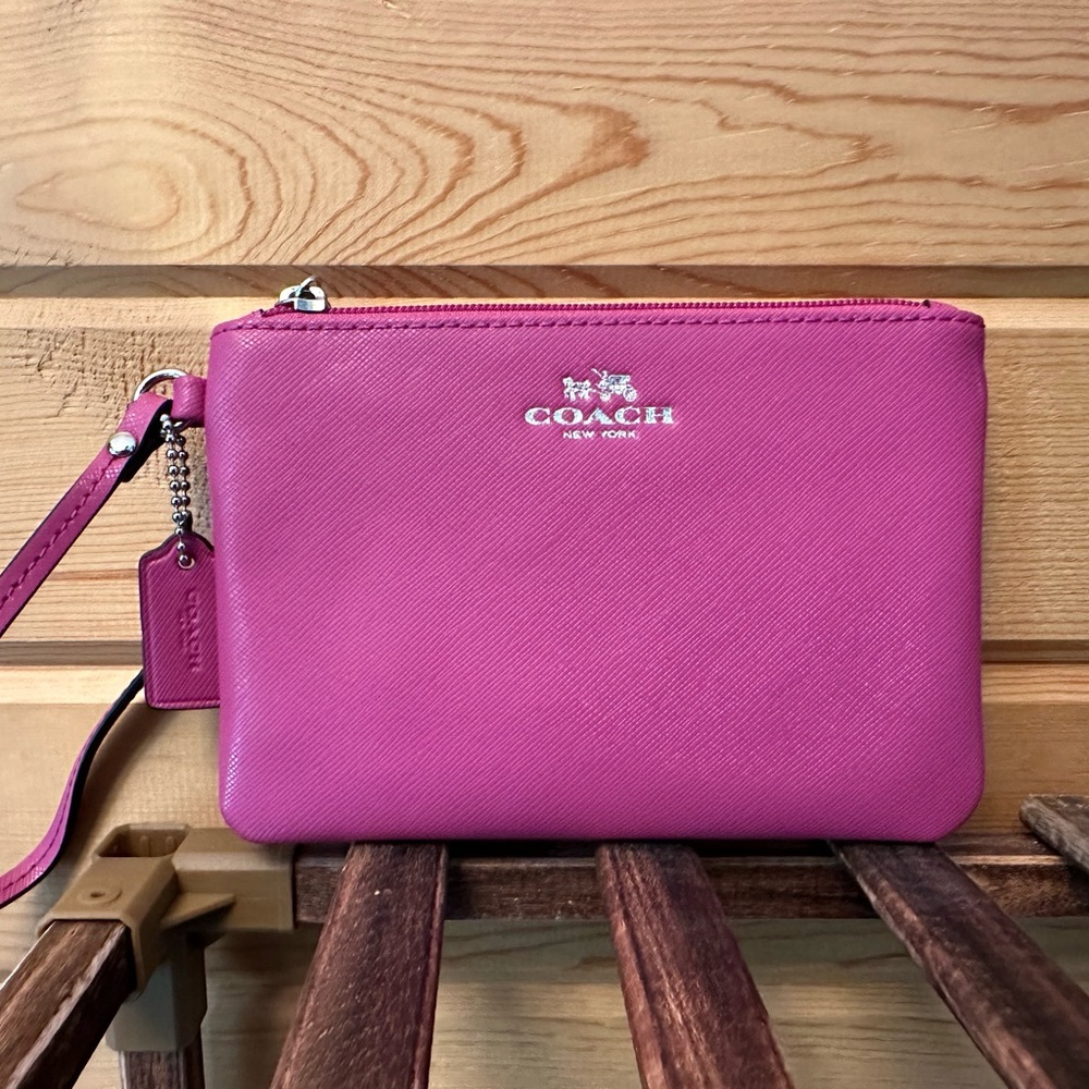 Coach fuchsia wristlet